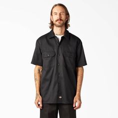 The Men's FLEX Relaxed Fit Short Sleeve Work Shirt is durable but lightweight and has a generous cut for easy movement. The comfortable FLEX technology stretches as you move, wicks away moisture to keep you dry, and has an easy-care stain release finish. The classic work shirt features dual chest flap pockets with button closures, and the left pocket even has a pencil divider for organization. A straight-hem cut means you can wear this piece tucked in or let it hang out. Work Shirt Outfit, Blue Work Shirt, Mens Work Shirts, Dickies Workwear, Work Shorts, Great Body, Work Shirt, Skater Style, Slim Fit Shirt