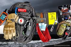 an assortment of items are placed on the back of a truck in front of dark clouds