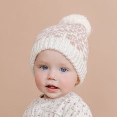 Time to go play outside in the snow with his hat to keep the noggin' warm! Keep your littles' heads warm in the winter with this beanie with snowflakes and a cute yarn pom. Details: Made from 100% Hand-knit Acrylic Hand wash Lion Hat, Urban Kids, Plaid Hats, Hand Knit Hat, Thick Yarn, Snowflake Pattern, Buy Buy Baby, Pom Pom Hat, Baby Boutique