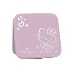 a pink hello kitty lunch box with the word impressions written in white ink on it