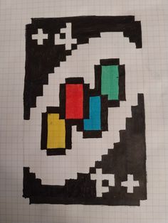 a piece of paper that has been drawn with colored squares and shapes in the middle