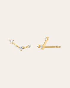 14k solid gold handcrafted constellation earring studs with diamonds. Available in yellow, white and rose gold. They are timeless and a must! Sold as a Pair Size: Approx. 7mm Diamond Carat Weight: Approx. 0.08 ctw Diamond Quality: VS Standard Production: 4-7 business days Rush Order Production: 2-5 business days Shipped from our L.A. Studio. This item is Final Sale. See here for details. Constellation Earrings, Pretty Ear Piercings, Earring Studs, Diamond Carat, Timeless Accessories, Diamond Earrings Studs, Constellations, Ear Piercings, Yellow White