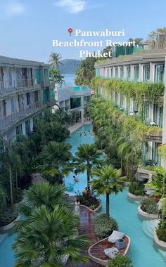 an aerial view of the pool and surrounding resort buildings in pattayaburi beach resort, phoket