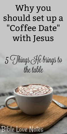 a cup of coffee sitting on top of a table