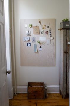 a room with a wooden crate on the floor