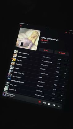 the music player is playing on the computer screen