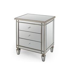 a mirrored nightstand with three drawers on one side and two doors on the other end