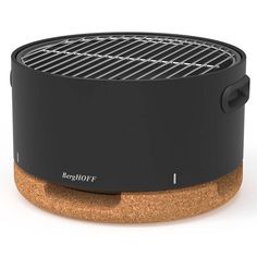 an image of a bbq grill with cork base on the bottom and side view