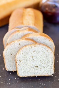 slices of white bread sitting on top of a counter