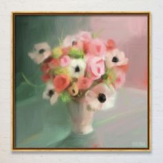 a vase filled with lots of pink and white flowers