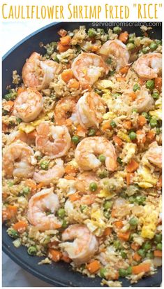 shrimp fried rice with peas and carrots in a skillet