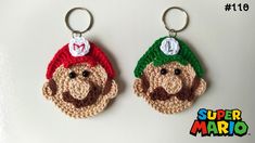 two crocheted keychains that have been made to look like mario bros