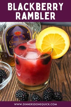 the blackberry rambler is served in a glass with ice and garnish