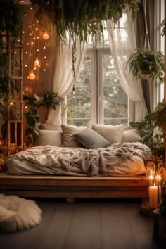 a bedroom with lots of plants and candles on the floor, along with a large window