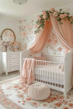 a baby's room with floral wallpaper and pink curtains