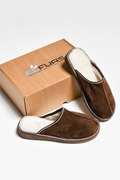 "The men's slippers are \"ugg boots\" with natural sheepskin in chocolate. The upper material is genuine Italian leather lined with felted wool (100% merino). The insole is made of Spanish sheepskin. The sole is made of EVA, a modern, environmentally friendly, and hygienic material -- plastic, silent, and non-slip. The manufactured model is ranged from 40 to 48 sizes. Sheepskin slippers are a great choice if you care about your health and prefer natural products. In natural fur slippers, the skin of your feet breathes. Sheepskin maintains an optimal temperature, and the feet in such slippers will be warm and comfortable. Sheepskin shoes can alleviate joint pain, and relieve fatigue, and stress. An important property of such slippers is the prevention of colds. Sheepskin slippers are suitab Mens Winter House Slippers, Slippers Ugg, Brown Slippers, Leather Slippers For Men, Ugg Style, Sheepskin Slippers, Men's Slippers, Warm Slippers, Home Shoes