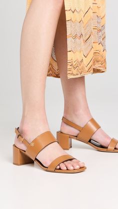 Upper: CowhideAdjustable buckle slingback strapLightly cushioned leather footbedBlock heelLeather soleImported, VietnamThis item cannot be gift-boxedStyle #TORYB50486 Caramel Corn, Heel Sandals, Women's Shoes Sandals, Block Heels, Tory Burch, Corn, Sandals Heels, Caramel, Shoes Sandals