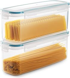 two clear storage containers with pasta noodles in them and one is filled with cheddar cheese