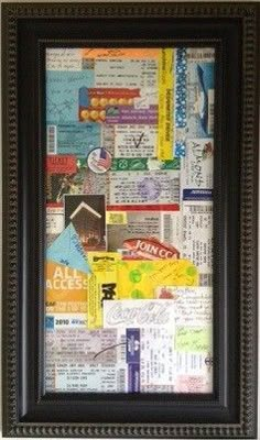 a black frame filled with lots of different types of paper