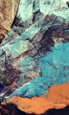 an abstract image of mountains and rocks with blue sky in the backgrouund