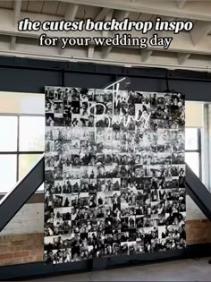 a black and white photo hanging on the side of a wall