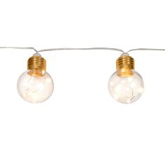 two light bulbs are hanging from a wire