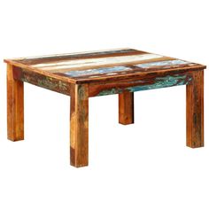 an old wooden table with peeling paint on the top and bottom part, sitting against a white background