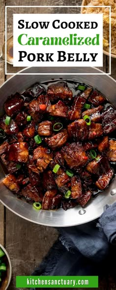 slow cooked caramelized pork belly in a skillet with green onions on the side