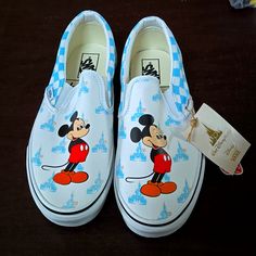 Brand New 50th Anniversary Walt Disney World Slip On Vans. Never Removed From The Box Except To Photograph. Light Blue Checkered With Disney Castle And Mickey On The Toe Box. Size: Women's 10.5 Mens 9 Walt Disney World 50th Anniversary, Vans Slip On Shoes, Disney World 50th Anniversary, Slip On Vans, Van Color, Vans Blue, Blue Checkered, Disney Castle, Vans Slip On