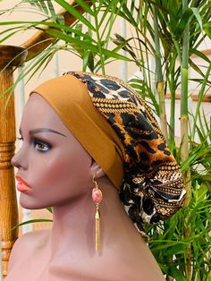 "This Elegant Turban/ Head Wrap is Ready To Wear. Made with stretchy jersey fabric. It is pre tied/wrapped and ready and easy to wear for your convenience. Eliminate the extra stress of head wrap and go the easy way. Perfect gift for chemo /alopecia patients. Gifts for moms, sisters and just for someone special. No more bad hair day! Head Wrap: Turban Main material :Stretchy Jersey Fabric Color: Yellow Size: Adult size *Fabric: Jersey Knit Fabric. Care Instruction: Hand wash in cold water, do no Knotted Bun, Wrap Turban, Knot Bun, Chemo Caps, Turban Headwrap, Turban Hat, Gifts For Moms, Bad Hair Day, Jersey Knit Fabric