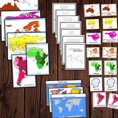 a table with maps and cards on it, including the countries in different colors for each country