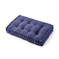 a blue cushion on a white background