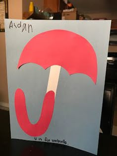 a card with an umbrella on it that says, adam u is for windblo