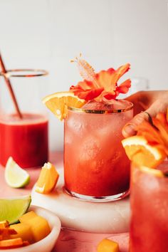 A bright, zesty, beautiful mocktail with hibiscus, orange, and mango. Naturally sweetened, just 6 ingredients, and perfect for summer gatherings! #minimalistbaker #mocktail #hibiscus #orange #mango Girly Mocktail Recipe, Light Recipes For Summer, Hibiscus Vodka Cocktail, Brunch Mocktail Ideas, Hibiscus Martini, Orange Mocktail, Drink Mocktail, Summer Mocktail, Light Drinks