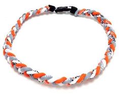 an orange and white rope bracelet with black clasps on a white background for sale