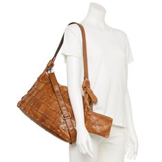 Carry your essentials in style with this AmeriLeather Miao leather shoulder bag. DETAILS 15.5"L x 10"H x 4.75"W Handle: 11'' drop Zipper closure Silver-tone hardware Interior: 1 zip pocket, 2 slip pockets Exterior: coin purse Water repellentCONSTRUCTION & CARE Exterior: leather Lining: polyester Wipe clean Imported Size: One Size. Color: Black. Gender: female. Age Group: adult. Bag Details, Shoulder Bag Black, Water Repellent, Leather Shoulder Bag, In Style, Cleaning Wipes, Gender Female, Zip Pockets, Coin Purse