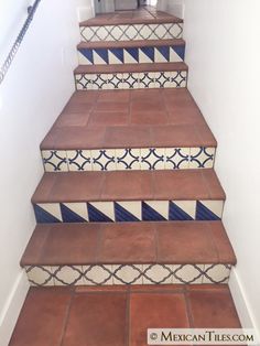 an image of some stairs with tile on them