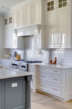 Bright, airy kitchen with classic white cabinets, subway tile backsplash, and stainless steel appliances, showcasing a clean, modern aesthetic. #TheKitchen #AKitchen #WhiteKitchenCabinets #KitchenCabinetColorIdeas Light Gray Countertops, Grey Countertops, Blue Cabinets, Subway Tile Backsplash, Green Cabinets