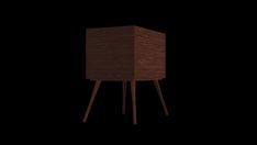 a wooden table with two legs in the dark