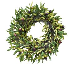 a green wreath with leaves and berries on it