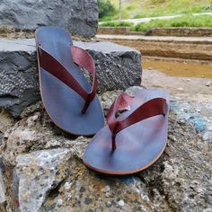 Greek handmade flat flip flops for men, crafted from calf leather. These leather men sandals feature a leather insole and a rubber anti-slip sole, ensuring unmatched durability and stability. Available in a timeless brown hue, these men's leather thongs are versatile for any occasion. Whether you are leisurely strolling along the beach or exploring the bustling city streets, these minimalist sandals provide both comfort and style with every step. 👕 Perfectly complementing all summer outfits, fr Leather Flat Sandals For Summer, Leather Slip-on Flip Flops With Ortholite Insole, Leather Flip Flops With Rubber Sole For Outdoor, Outdoor Leather Flip Flops With Rubber Sole, Leather Flip Flops With Ortholite Insole For Summer, Brown Flip Flops With Ortholite Insole, Leather Toe Loop Flip Flops For Beach, Leather Round Toe Flip Flops For Beach, Outdoor Leather Slippers With Rubber Sole