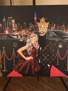 a woman standing next to a man wearing a mask on top of a poster in front of a city