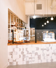 Cafe-bakery in Oakland, California, where wood, tiles and concrete combine to create a soft industrial vibe Cafe House Design, Industrial Cafe Design, Soft Industrial, Industrial Cafe, Cafe House, Baking Bread, Bread And Pastries