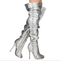 Snakeskin Print Faux Leather Thigh High Boots Brand New In Box Final Sale Rock These Snake Print Thigh High Boots With A Short Bodycon Dress And An Oversized Cardigan. The Featuring Includes A Reptile Print Faux Leather Fabric, Peep Toe, Slouchy Design, Inner Zipper Closure Followed By A Cushioned Footbed. Approximately 5-Inch Heel, 22.5-Inch Shaft, And 18-Inch Circumferences. Snake Print Boots For Fall Party, Fall Party Boots With Snake Print, Snake Print Party Boots For Fall, Snake Print Party Boots, Tan Riding Boots, Pearl Boots, Thigh High Stiletto Boots, Thigh High Heels, Christian Louboutin Boots