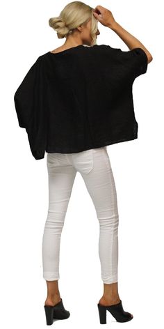 Linen kaftan-style blouse with round neck. 100% Linen One Size Fits Most Made in Italy Oversized Crew Neck Blouse For Layering, Oversized Tunic For Layering, Oversized Blouse With Unlined Sleeves, Chic Long Sleeve Poncho, Lagenlook Long Sleeve Poncho, Lagenlook Tops For Daywear, Crew Neck Blouse For Layering, Spring Lagenlook Blouse With Batwing Sleeves, Spring Crew Neck Tunic