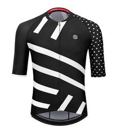 a black and white jersey with polka dots on the sleeves, it's designed to look