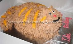 a birthday cake in the shape of a cat