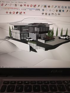 a computer screen with a drawing of a house on it