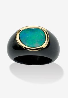 Be seen in black and blue! Contrasts in vivid color is what this ring is all about. A large blue opal cabochon is perched atop black jade to form this beautiful ring. It will add a trendsetting flair to any outfit. 10k gold. Available in sizes 6-10. As this item contains genuine jade, the actual stone colors may vary slightly.FABRIC: 10k Yellow GoldMain Stone: 1 Oval Cabachon Cut Genuine Blue Opal, 3.00 carats, 12 mm x 10 mm1 Special Cabachon Cut Genuine Black Jade, 21 mm x 14 mmDimensions: 14 m Black Oval Cabochon Opal Ring, Black Jade Ring, Black Opal Jewelry, Bezel Set Cabochon, Black Jade, Malachite Rings, Cabochon Ring, Jade Ring, Ring Blue