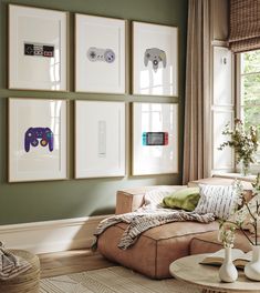 a living room filled with furniture and pictures on the wall next to a coffee table